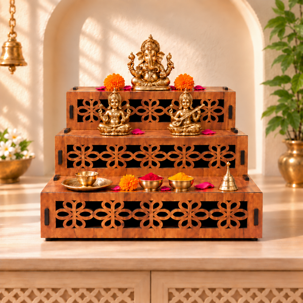 Heartily Vedika three-tier teak-finish pooja stand displaying Lakshmi and Saraswati idols, diyas and flowers