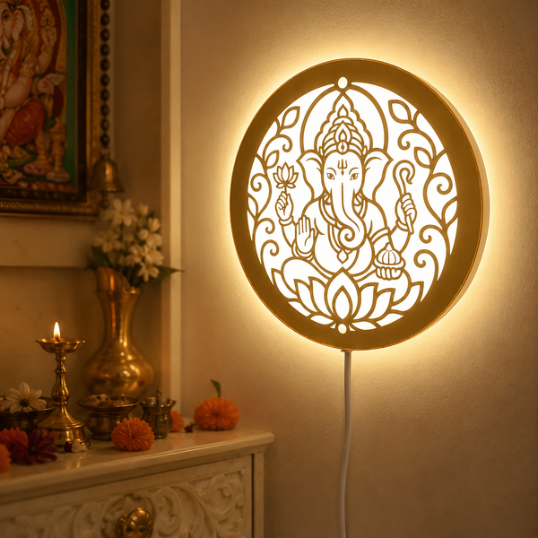 Heartily Ganpati Ji LED wall light with golden mirror acrylic finish, warm white halo lighting, modern spiritual wall decor for home entrance, pooja room and living room.